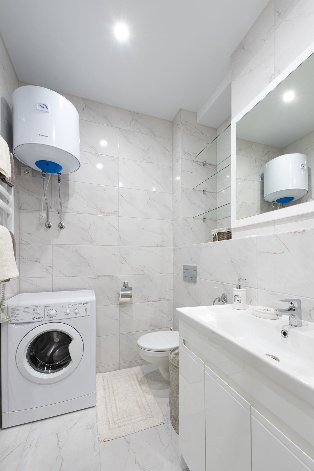 Bathroom with boiler and washing machine affected by hard water