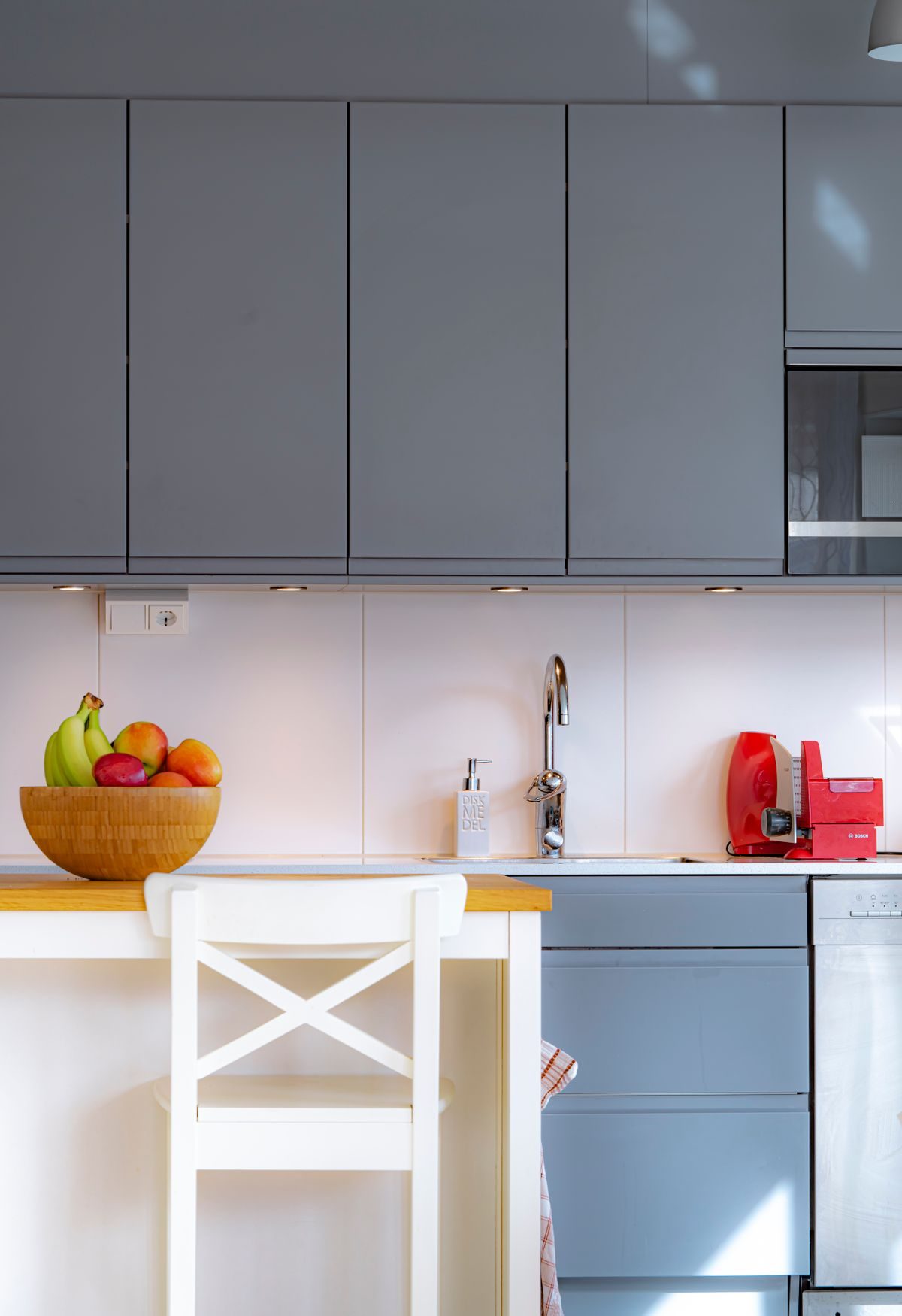 Modern kitchen with new gas range and plumbing